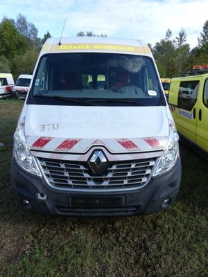 a white van that is parked next to a yellow van