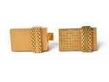 two gold cufflinks with a woven design on each of them