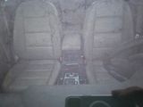 someone is taking a picture of the inside of a car with a cell phone