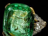 an emerald and diamond ring