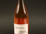 a bottle of wine that is sitting on a table