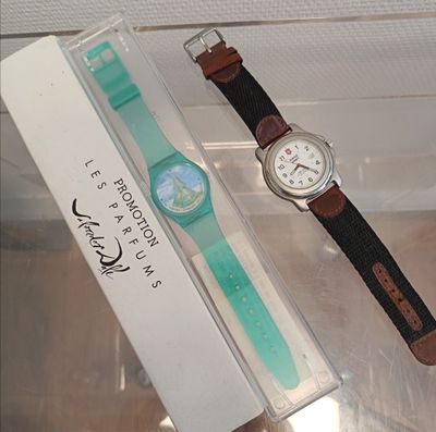 a watch that is sitting in a box on the table