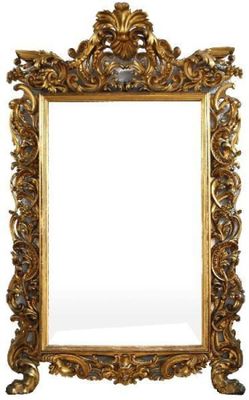 une image d'un miroir avec un cadre doré sur un fond blanc