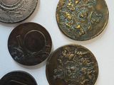 a lot of coins that are sitting on a table
