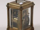a small clock that is sitting on a table