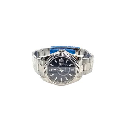 rolex watch with a black dial and a silver bracelet