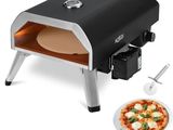 a pizza oven with a pizza on it next to a pan of pizza