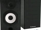 the speakers are black and white with a white circle on them
