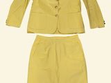 the suit is yellow and has buttons on the front