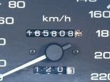 a close up of a speedometer on a car ' s dashboard