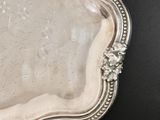 a silver tray that is sitting on a table