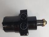 a close up of a black and white object on a white surface