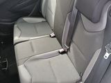 four seats in the back of a car that are empty