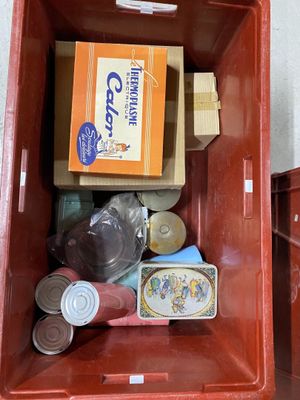 a red box that has some food inside of it