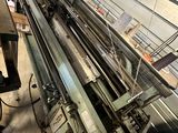 a machine that is working on a piece of paper