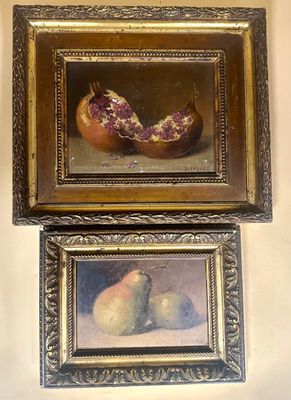 two framed paintings of pears and pears on a wall