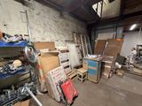 a room filled with lots of boxes and tools