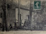 an old picture of a group of men standing outside of a building
