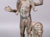 an image of a statue of a man holding a baby