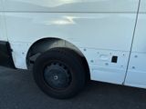 a white van that is parked in a parking lot