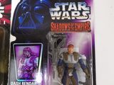 a star wars action figure on the table next to other action figures