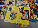a lot of comic books on the table together