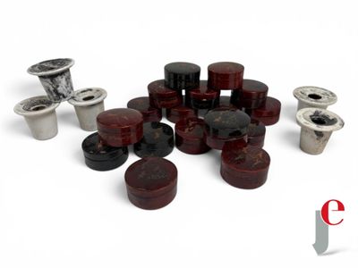 a lot of different types of screws on a white surface