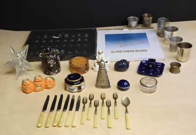 a table with silverware and silverware on it