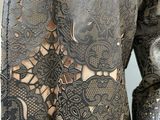 a close up of a woman ' s dress with lace on it