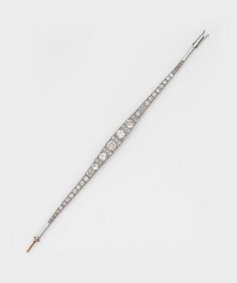 an antique diamond and silver broochle pin