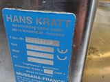 a metal container with a blue label on it