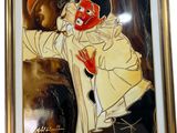 tableau représentant un homme portant un masque rouge sur le visage