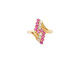 a yellow gold ring with pink and white diamonds