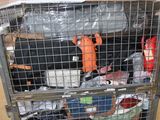 a metal cart with a bunch of items inside of it