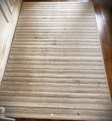 a rug on the floor next to a door
