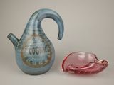 a blue and pink pitcher and a pink glass bowl