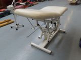 an image of a medical examination table in a room