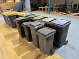 a lot of trash cans that are sitting on the floor