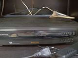 a picture of a dvd player with a cord plugged into it