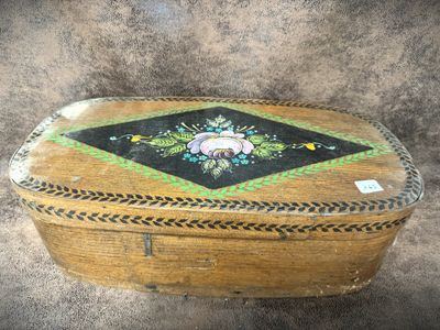 an image of a wooden box with a floral design on it
