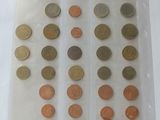a lot of coins in a plastic bag on a table