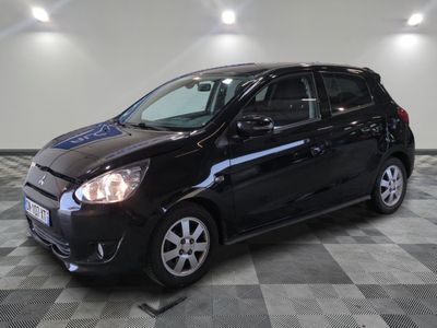 a picture of a black car parked in a garage