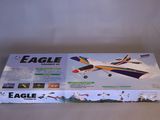 the box is open to show the contents of a model airplane