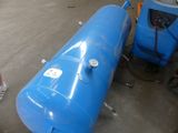 two blue tanks sitting next to each other on the floor