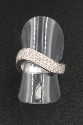an image of a silver ring with diamonds on it