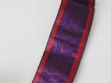 purple and red ribbon on a white table