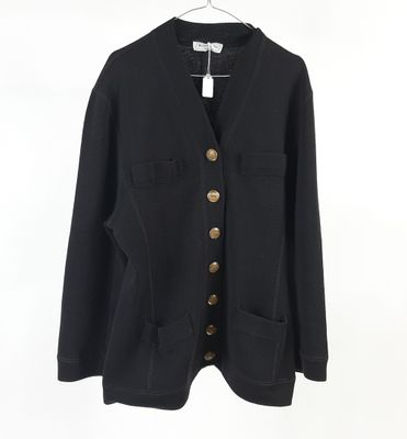 Yves Saint Laurent Variation, longue veste en lainage noir à…