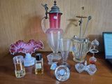a table with a lot of glass items on it