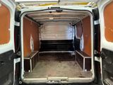 the inside of a van with a bench in the back of it