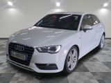an image of a white audi car in a showroom
